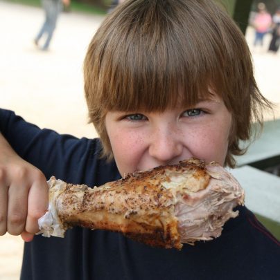 Enjoying a Turkey Leg